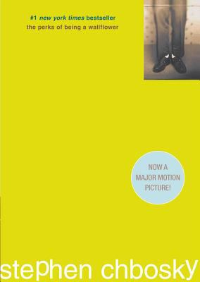 The cover of Perks of Being a Wallflower. An entirely yellow cover, the only design is a small image of a pair of legs wearing brown dress shoes and long brown trousers, standing in a room with brown carpet and white and brown wallpaper. 